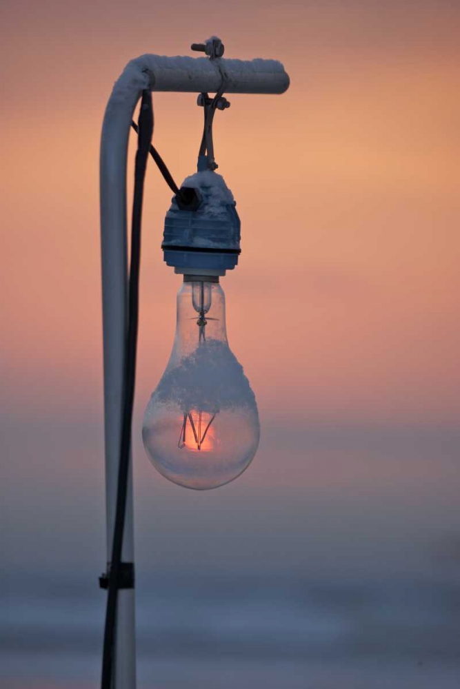 Japan, Hokkaido Sunrise through a ight bulb